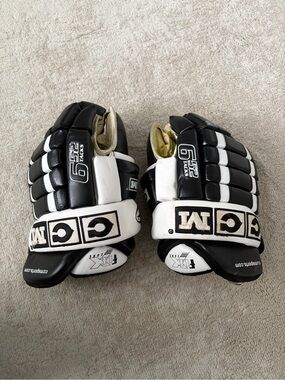 Black and White hockey gloves 13”